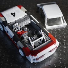 Load image into Gallery viewer, MEGA BLOKS - Hot Wheels Audi 90 Quattro IMSA GTO, Includes 1 Collectible Diecast Car, 973 Piece Collectible Building Toy Set
