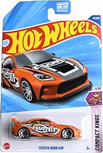 Hot Wheels toy car with Toyota GR86 Cup design on a blue background